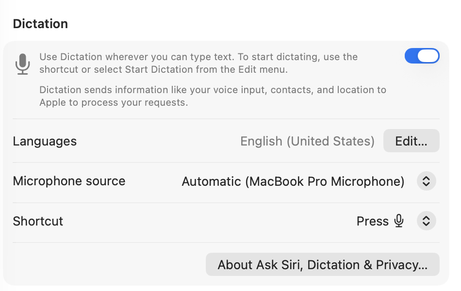 The Dictation section of Keyboard settings on macOS 26: the Dictation switch, Languages with an Edit button, Microphone source, and Shortcut set to Press the Microphone key